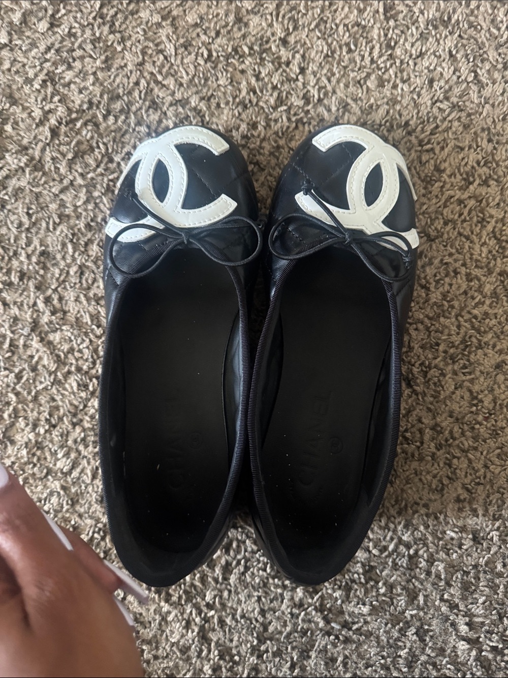 CHANEL Black Ballet Flats with White CC Emblem